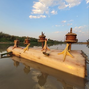 Banana tree floating Fish trap with wooden wheel Hook fishing technique Boy's best fish hunting system. #fish_trap | Discovery Site