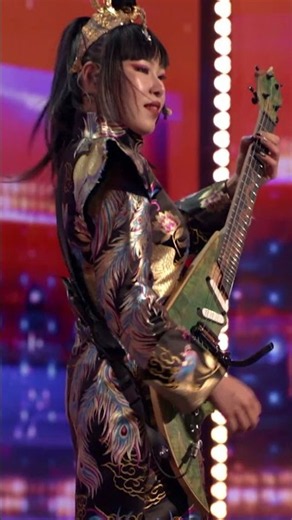 it doesn't quite look like a guitar... but just wait until she plays it! 😳