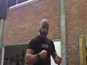 Bane does some weightlifting