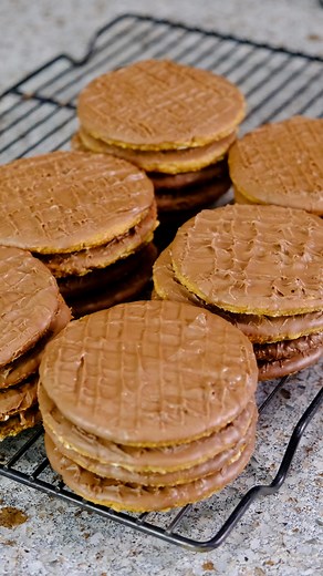 The Multifaceted Baker on Instagram: "Hobnobs! I wasn’t sure how I was going to make these but then I remembered I had a graham cracker recipe that I could easily customize to make this delicious treat 🙏🏾 Hobnobs Recipe: Yield: 26 Biscuits 2 cup whole wheat flour plus more for dusting 1 cup rolled oats 1 teaspoon baking soda 1/2 teaspoon Salt 7 tablespoons butter softened 1 cup light brown sugar packed 3 tablespoons whole milk 1/3 cup light cornsyrup 1 teaspoon vanilla extract Milk Chocolate f