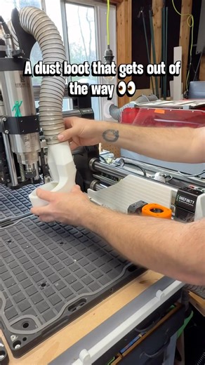 A dust boot that gets out of the way for the CNC