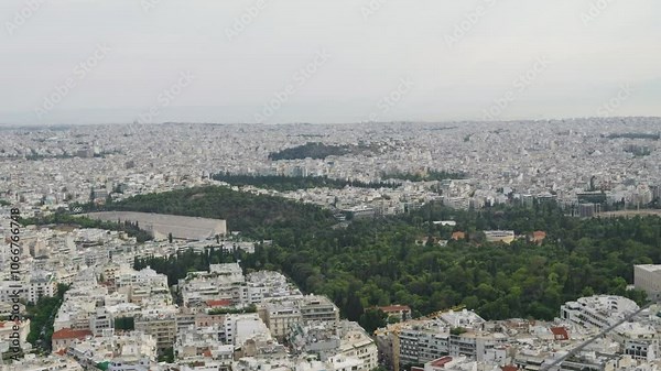 Wide open urban sprawl of Athens, Greece with Olympic stadium