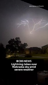 3.3M views · 45K reactions | Lightning was seen illuminating the sky over Ashland, Nebraska, early Saturday as severe weather brought winds of up to 80 mph through the region. | CBS News | Facebook