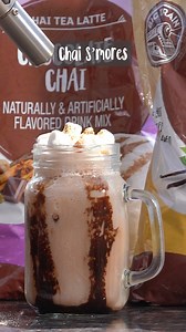 We'll have S'more of this, please! 🏕️ Ingredients: 8oz of Milk .75oz of Big Train Vanilla Chai .75oz of Big Train Chocolate Chai .75oz of DaVinci Gourmet Marshmallow Syrup DVG Chocolate Sauce Graham Crackers and Mini Marshmallows for garnish Directions: Add milk, Big Train Vanilla Chai, Big Train Chocolate Chai, and ice to the blender cup and blend until smooth. Add frozen chai to a rimmed glass with crushed graham crackers and a chocolate swirl. Top with Davinci Gourmet cold foam and mini mars