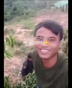 Cambodian T-55 Tankers cooking and camming up their vehicle with live camouflage. | Tankers