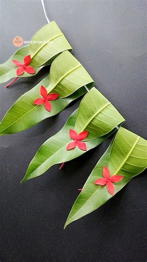 139K views · 23K reactions | ✨ Traditional touch for the doorway! Handmade toran with mango leaves & rangan flowers  Simple • Festive • Beautiful 杖 #ToranDecoration #FestiveDecor #HandmadeCraft #IndianTradition #MadeByKaushika | Made by Kaushika | Facebook