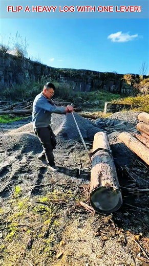 Simple Lever Trick to Flip Heavy Logs Without Machines.