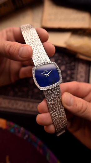 GOLDAMMER on Instagram: "Lapis Lazuli & Diamonds - 18k White Gold - 1970s Bold design. Stone-cold elegance. This extraordinary Piaget TV 12735 from the 1970s is a breathtaking display of artistic geometry and rare materials. Its distinct TV-shaped case in solid 18k white gold is paired with a factory-set diamond bezel, featuring 46 brilliant-cut diamonds that elevate the piece to a new level of luxury. At its center, the deep blue Lapis Lazuli stone dial adds natural depth and intrigue. Rarely s