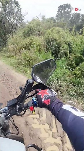 Trail Riding Accident: Biker Slips on Muddy Path and Crashes || WooGlobe