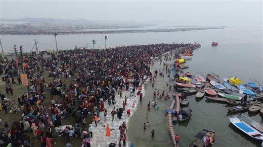 India: Pilgrims brave chilling winters to take holy dip at Magh Mela on Makar Sankranti