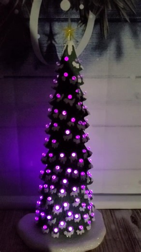 Slim Christmas tree 🎄 18.5 inches tall by 6 inches wide, glitter covered snow base 8 inches wide. Painted with acrylic, acrylic snow and ultra fine glitter. I used a small LED color changing puck light under the tree. Comes with clear and yellow star. https://www.etsy.com/listing/4410632813/ceramic-christmas-tree-slim-tree-185-h-x #sandysfiredartstudio #CeramicChristmasTree #handmadebyseller | Fired Art Studio