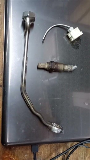Get your Jeep 3.6 liter LH upstream Oxygen sensor out in 10 minutes with this custom tool.