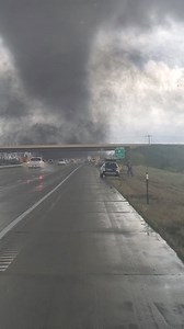 Driving right on through was not on the tornado safety chart! 😬🌪 This tornado was crossing the interstate in Nebraska a few weeks ago. | Ric Kearbey