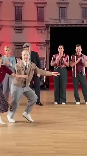 Vintage Dance Performance in Retro Attire