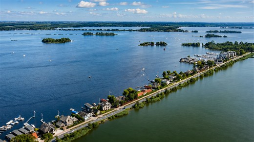 Where roads run between two vast lakes