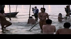 Naga sadhus have a holy bath at Ardh Kumbh Mela