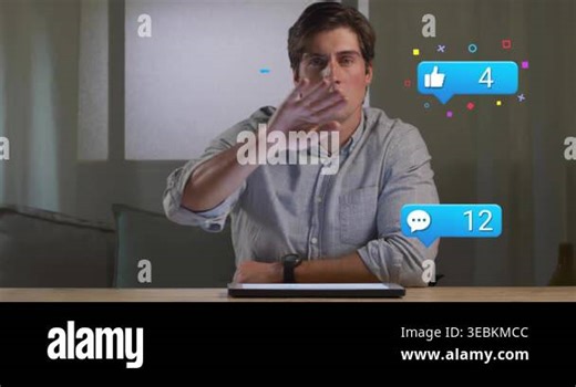 Man gesturing at wooden table, showing floating social media icons for digital marketing demo. Professional, technology, modern, communication, workspace, interaction, casual Stock Video Footage - Alamy