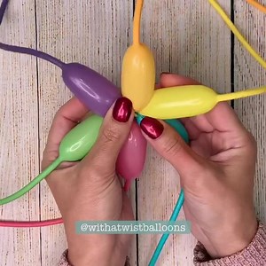 I’ve been wanting to make this rainbow balloon bracelet for a while. 🌈 It looked about this cute in my head. 😁 Maybe a smaller centre next time. 🤔 You can find an extended version of this on my YouTube channel. 💕 https://www.youtube.com/c/JackieO321 | With a Twist Balloon Creations