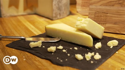 What makes cheddar cheese a worldwide favorite?