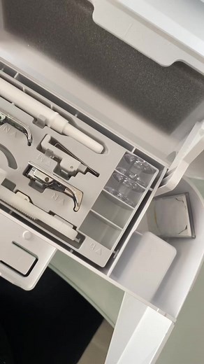 Exploring a White Sewing Machine's Inner Components