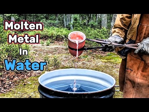 Pouring Molten Aluminum into a 55 Gallon Drum of Water - Melting Metal