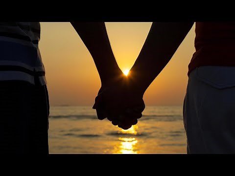 Beautiful Couple walking on the Beach at Sunset | Free Stock Videos Footage | No Copyright