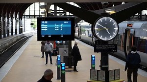 Copenhagen, Denmark - 13 April 2017 - Copenhagen train station board and clock slow motion video