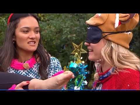 New Zealand TV presenter foot kiss