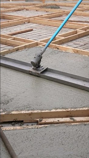 Screeding Freshly Poured Concrete Using a Vibrating Screed