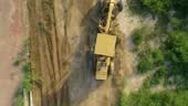 4K aerial drone video of Large Caterpillar earth movers and grading...