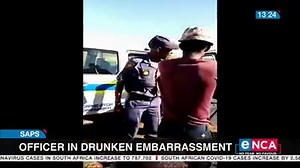 18K views · 301 reactions | A video of a seemingly drunk police officer is doing the rounds on social media. Members of the public filmed him, in full uniform, struggling to stand steady and inspect a damaged vehicle. #eNCA Courtesy #DStv403 | eNCAnews | Facebook