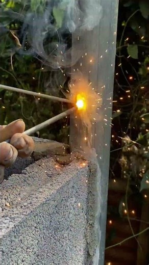 Welding steel bars into the column.