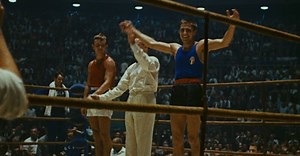 Boxer Nino Benvenuti takes Olympic gold in Rome