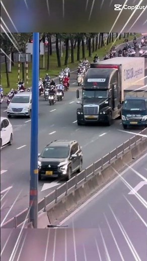 Container trucks arrive and depart from Cat Lai port for import and export