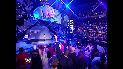 Torrie Wilson Gives A Sneak Peek At Her Bikini For Judgement Day SmackDown 05.15.2003 (HD)