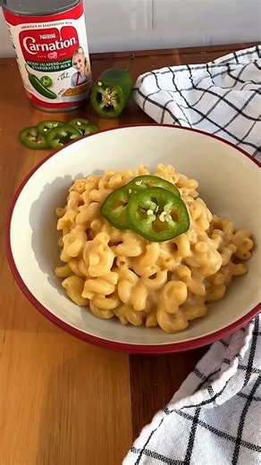 One pot. Big flavor. One pot mac and cheese with Carnation Kickin’ Jalapeño Flavored Evaporated Milk! 🌶️🧀 Serves 4-6 Ingredients 12oz Macaroni noodles Water Salt 12oz can Carnation Kickin’ Jalapeño Flavored Evaporated Milk 6oz sharp cheddar cheese, shredded 6oz pepper jack cheese, shredded 2 Tablespoons salted butter How to make kickin’ jalapeño one-pot mac and cheese 1. Add macaroni noodles to a large saucepan. Pour in enough water to just cover the pasta. Bring to a boil over high heat. Cook