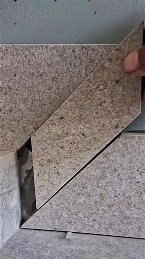 Diamond-cut granite cutting techniques for stair corners.