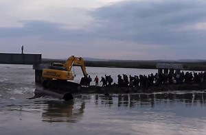 How to cross a river in Russia.