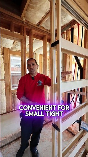 Installing a pocket door framing to separate the bathroom and laundry room