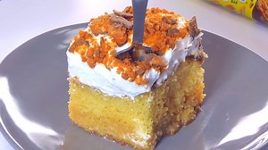 Butterfinger Poke Cake is insanely delicious, simple and ADDICTIVE! Poke cakes just get better overnight and stay moist and delicious. The perfect potluck dessert! Get the recipe: https://www.auntbeesrecipes.com/2017/07/butterfinger-poke-cake.html pin for later: https://www.pinterest.com/pin/410742428515959684/ | Aunt Bee's Recipes