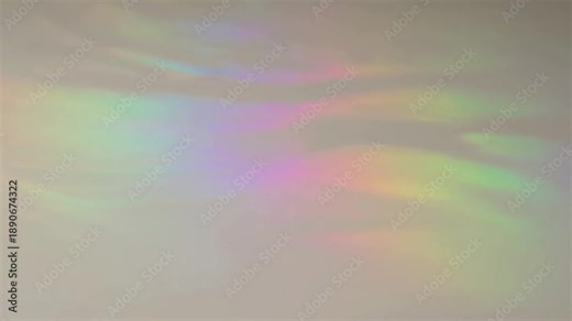 Subtle Color Transitions Medium shot, observing the slow, organic evolution of colors and patterns as the thin-film interference gently washes across an abstract, neutral background, emphasizing