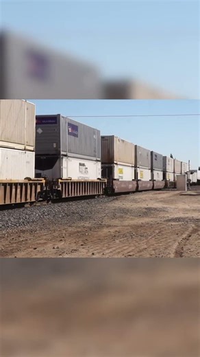 Speeding Intermodal With a leaning Container (looks like its going to tip over)