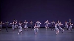 Like many ballets in NYCB's repertory, Tschaikovsky Piano Concerto No. 2 underwent significant aesthetic refinement by George Balanchine to arrive at its current incarnation. The piece began as an homage to the imperial Russia of Balanchine's youth and was titled Ballet Imperial, complete with classical tutus and an ornately framed painting of the Imperial Winter Palace for the backdrop. By the 70's, Balanchine felt that the ballet's references to tsarist Russia were becoming tone deaf, so he el