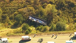 See aerial video of overturned bus on New York interstate