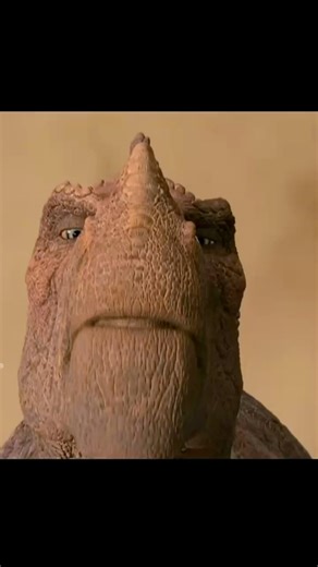 Kron and Aladar are Iguanodon, a herbivorous dinosaur that lived around 125 million years ago during the Early Cretaceous. They grew about 8 to 10 meters long (26 to 33 feet) and are recognized by their beaked snouts and thumb spikes, which were likely used for defense. The movie mixes animals that never lived at the same time. Carnotaurus, for example, lived much later, around 70 million years ago in South America, so it would never have encountered Iguanodon. The lemur-like characters are base