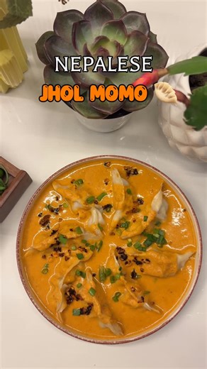 Sudipa Chowdhury🌵 on Instagram: "• NEPALESE JHOL MOMO • Lightly fried dumplings soaked in a savoury, nutty broth🫰🏻 And also it’s a perfect blend of spices , peanuts and momos 🫶🏻 A little bit Nepal on a plate ❤️ Whenever I see jhol momos, my heart skips a beat 😵‍💫 . . . . ( jhol momo, momos, dumplings, Nepalese food , Nepalese street food , love for momos, momo lovers , Nepali cuisine, food, foodlovers , fyp, street food, love for food , com