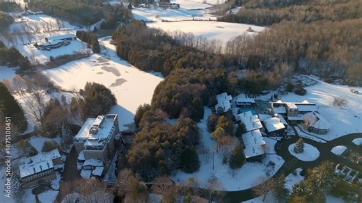 Aerial Flyover Of The Millcroft Inn And Spa Luxury Retreat During Sunset At Winter In Alton, Caledon, Ontario.
