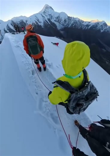 Moment hiker plunges to his death from 18,000ft mountain 'after taking selfie'