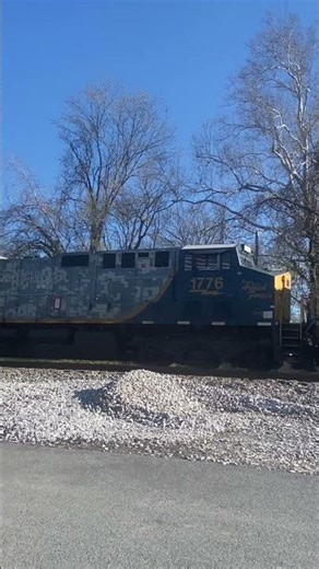 CSX C733 WITH CSX 1776 SPRIT OF ARMED FORCES TRAILING REAR DPU