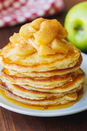 These fluffy Apple Pancakes are loaded with tangy-sweet apples for the ultimate breakfast treat. 🍏🥞 RECIPE: https://natashaskitchen.com/apple-pancakes/ | NatashasKitchen.com